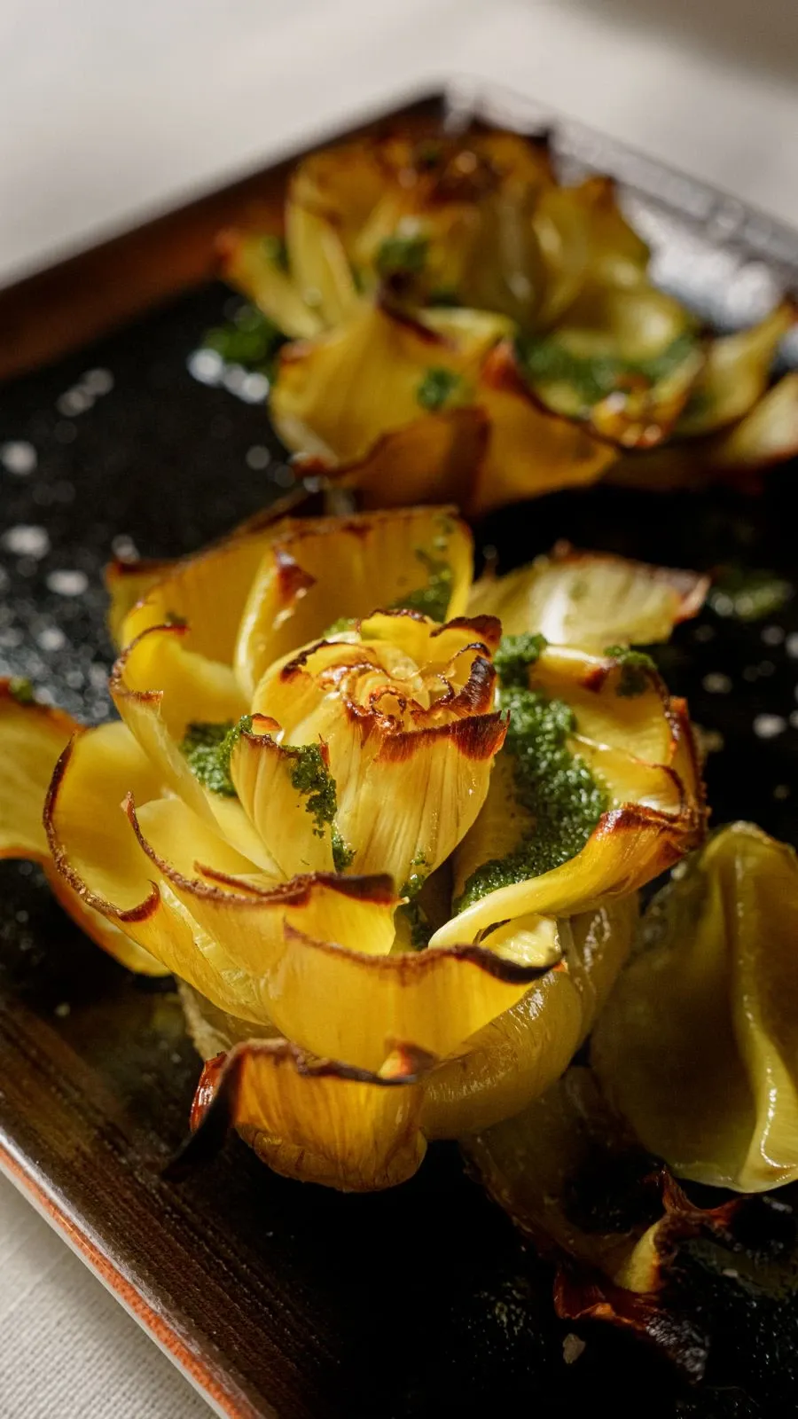 Alcachofas confitadas en flor